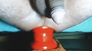 Extreme anal fisting and dildo insertions.