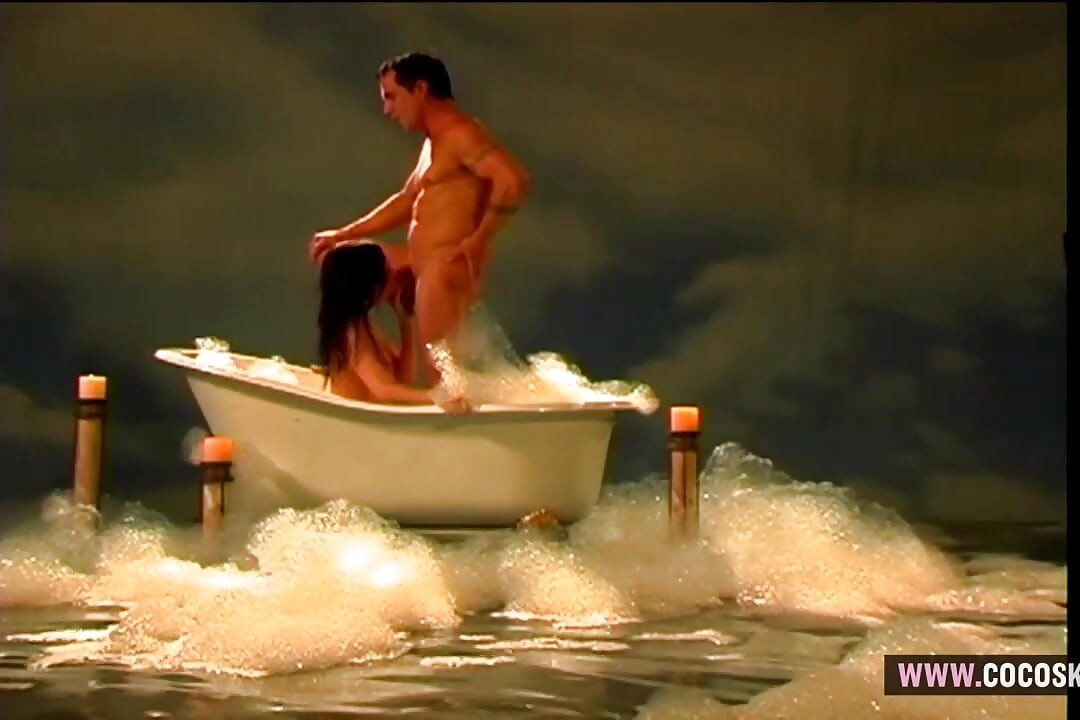Brunette Angel with Red Wings Gets Wild in Bubbly Bathtub