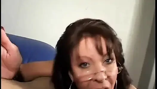 MILF with a gorgeous body and glasses jerks and sucks
