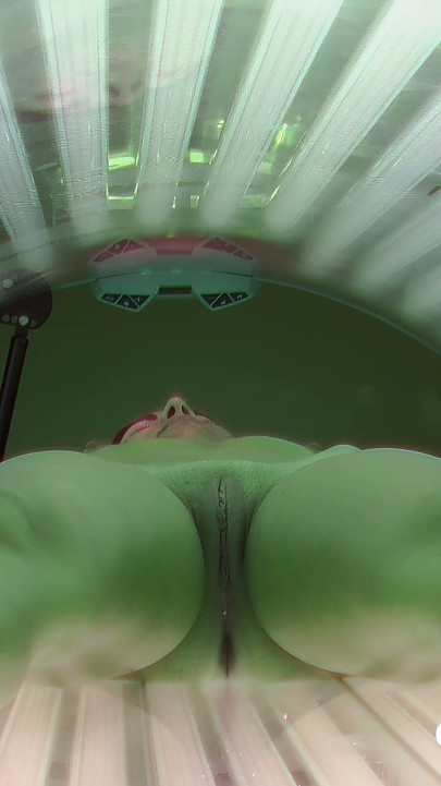 Czech Solarium 92: Brunette Enjoys Her Solarium Session, Flashes Her Pussy