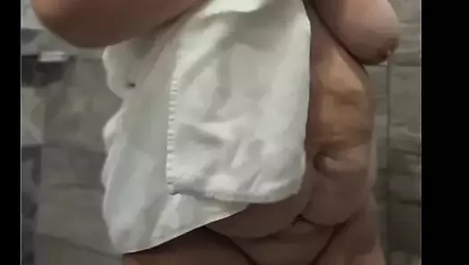 Fat BBW Granny Amateur takes a shower. Her big boobs and soft pussy.