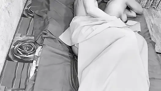 Couple caught on camera having sex in bed .