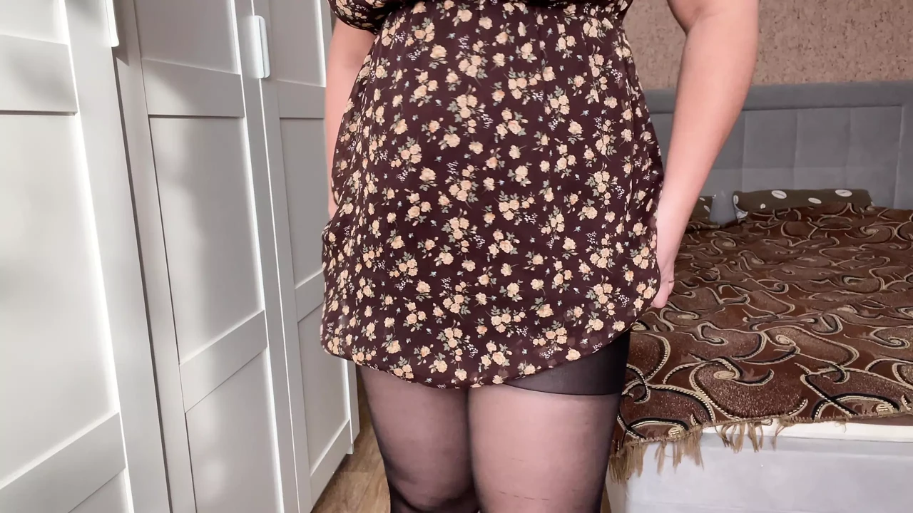 Beauty in sexy pantyhose poses and caresses her holes to orgasm