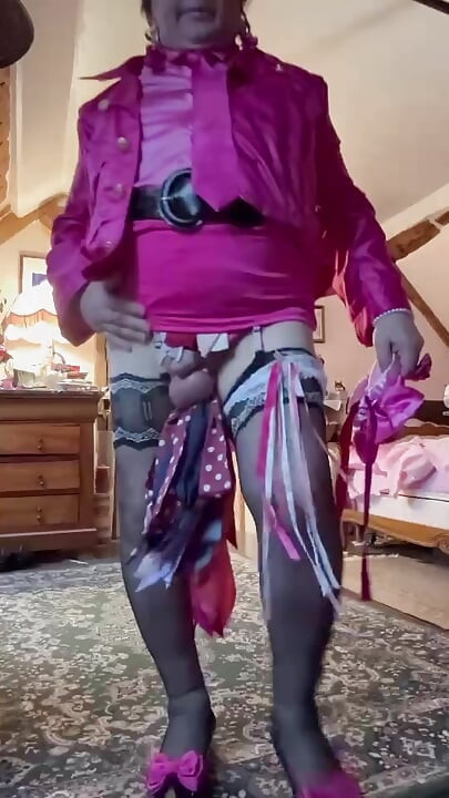 Dressed in a fuchsia miniskirt for her flight attendant party
