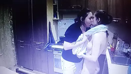 Two young lesbian girls kiss and have sex together