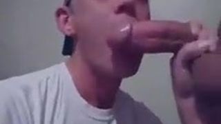 Young guy deepthroats a big, thick cock.