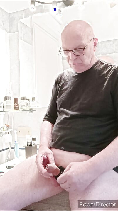 small caged cock and toothbrush