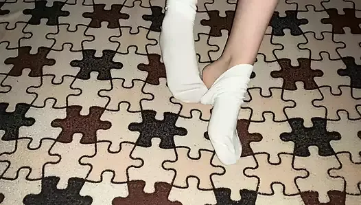Gloria Gimson caresses her sexy feet in white cotton socks