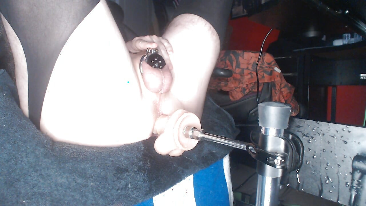 Caged sissy fails fucking machine sync