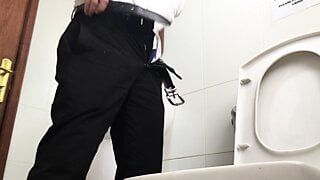 Taking a break from work to piss and maturbate my hard cock
