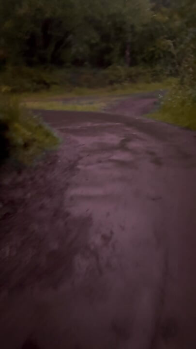 Left clothes in car for a barefoot naked walk in the rain down a lane never walked even clothed