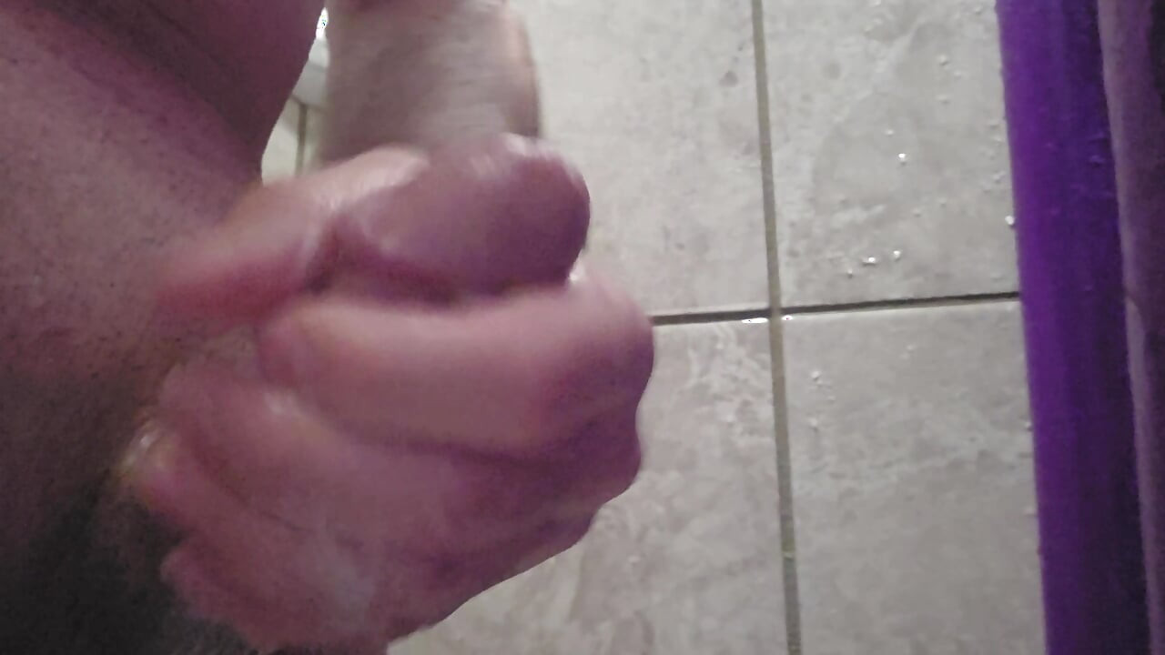 Solo jerk in public gym shower.
