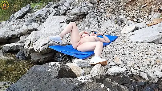 Outdoor solo masturbation on a wild beach. 