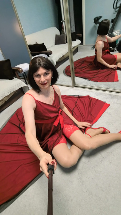 In a red long dress