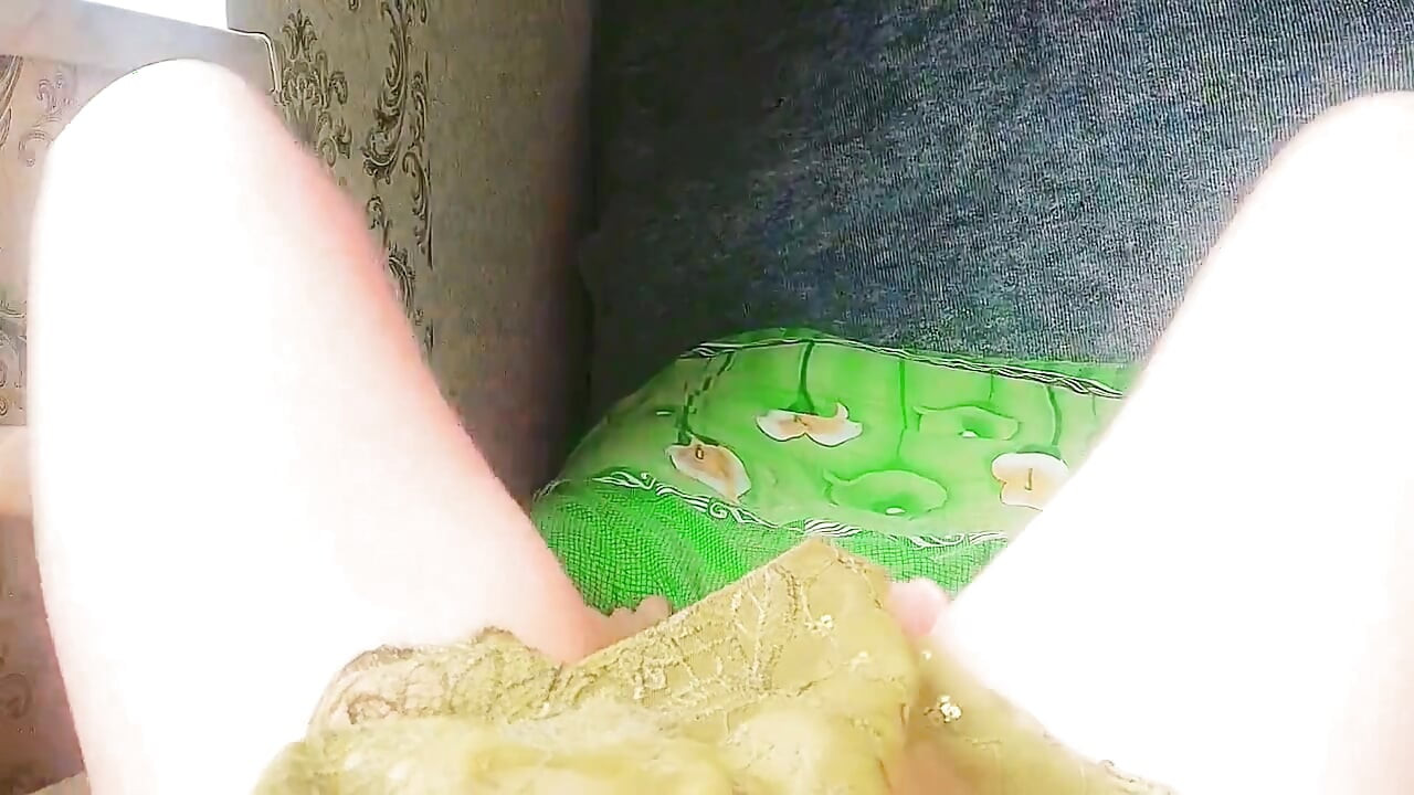Playful trans girl showing thigh tattoo in short skirt