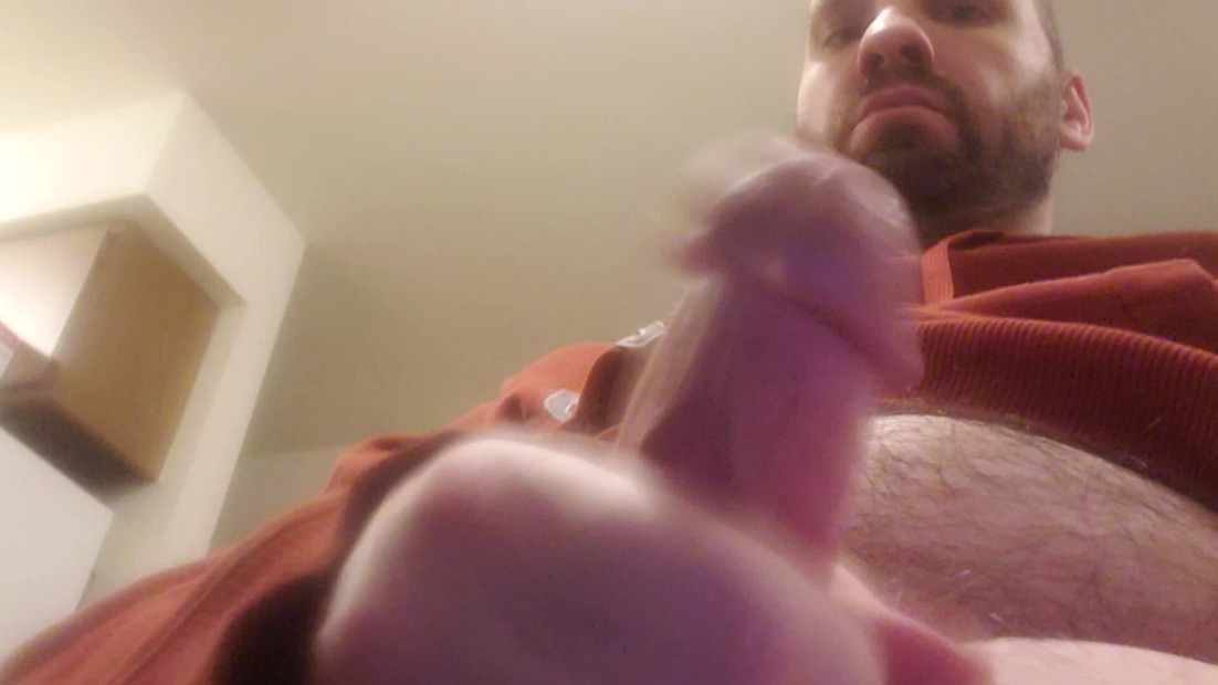 Bearded Guy in a Hoodie Jerking Off