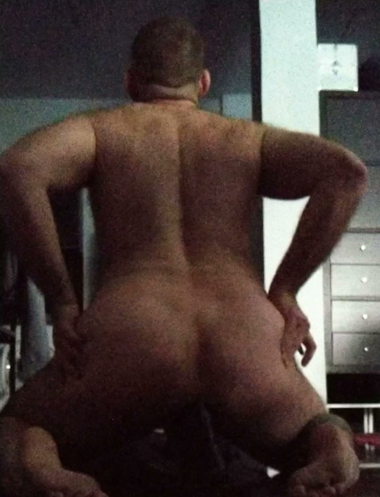 Riding a dildo
