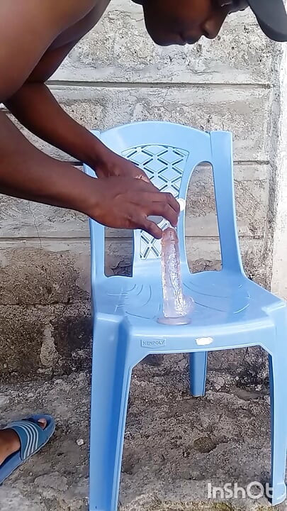 Naughty horny boy fucking his asshole with a big dildo outside