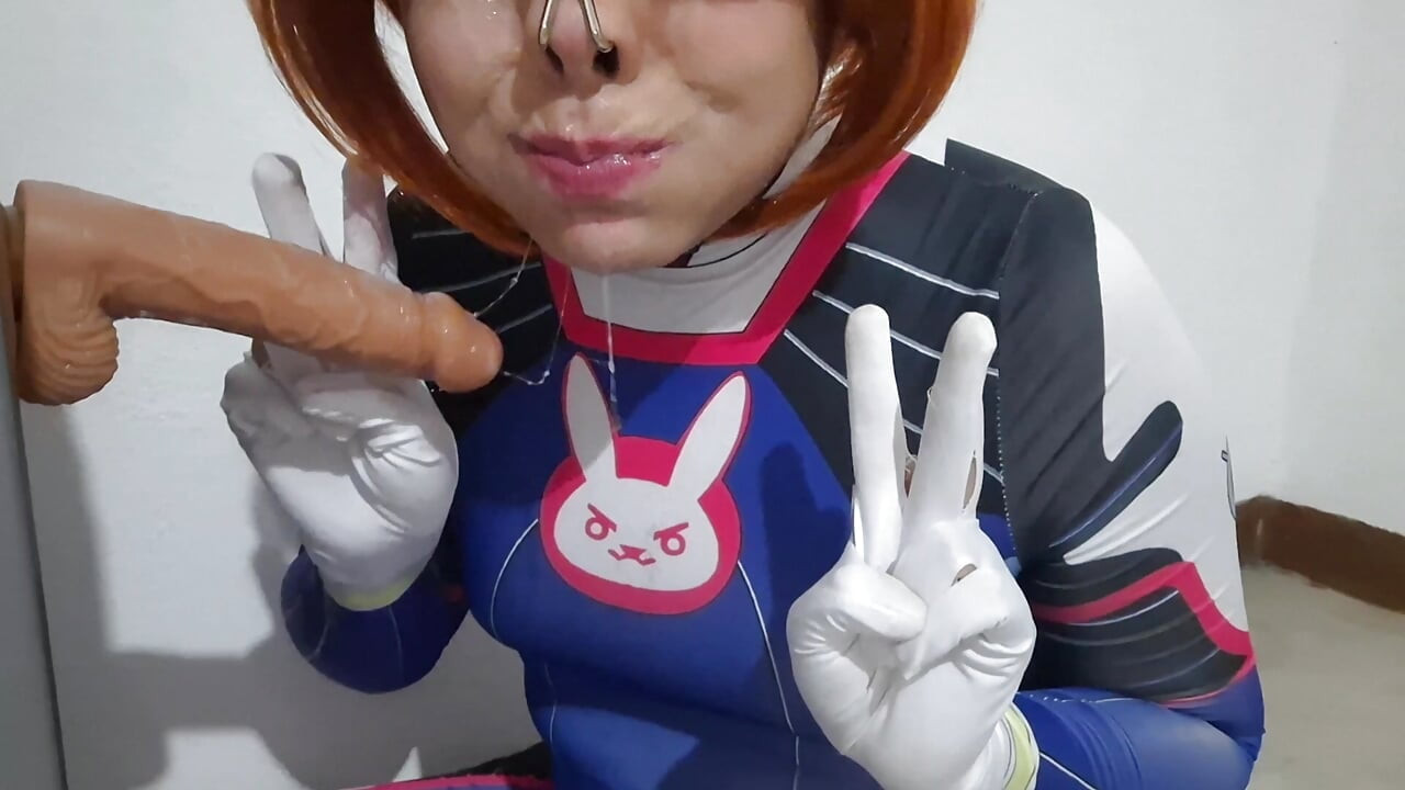 Femboy with Dva Cosplay and BDSM Nosehook Giving a Blowjob, Eating Cum and Deepthroat to Big Dildo