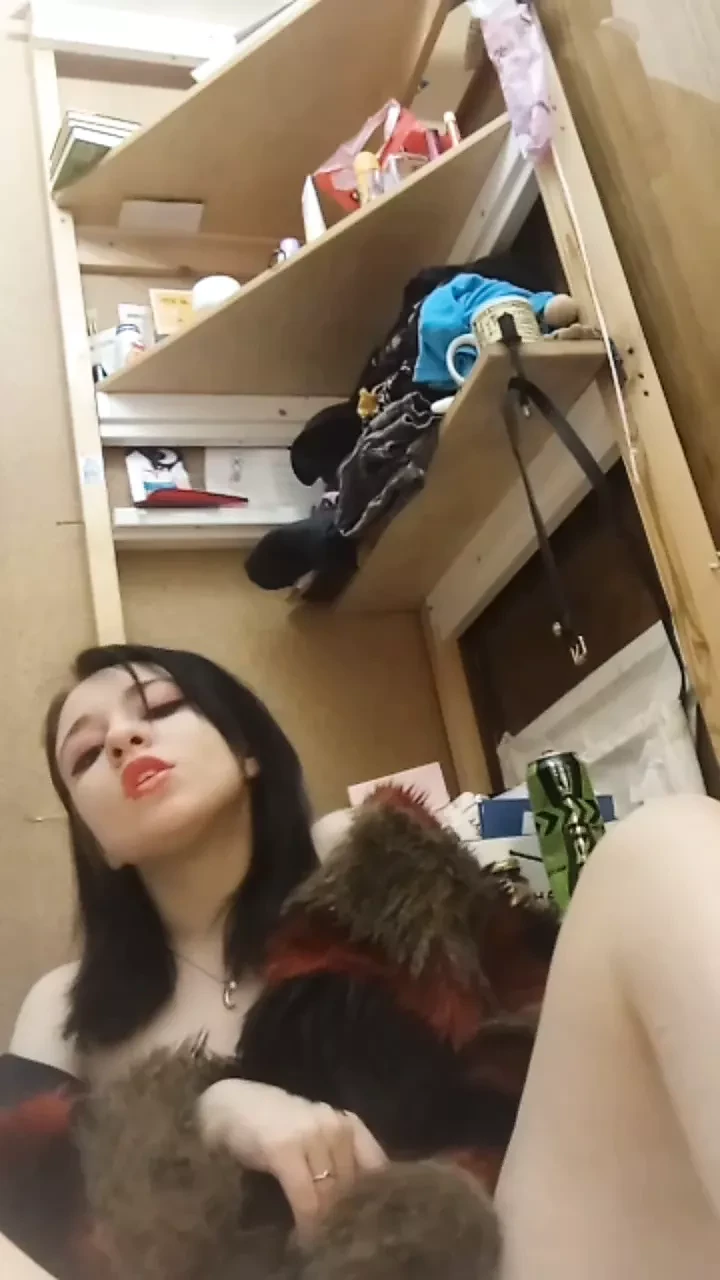 Gentle homemade masturbation in a black fur coat with a sensual orgasm