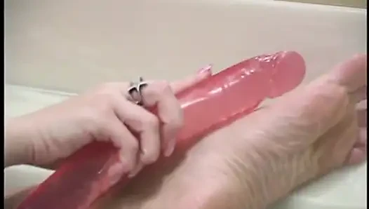 Horny MILF masturbating in the bathroom