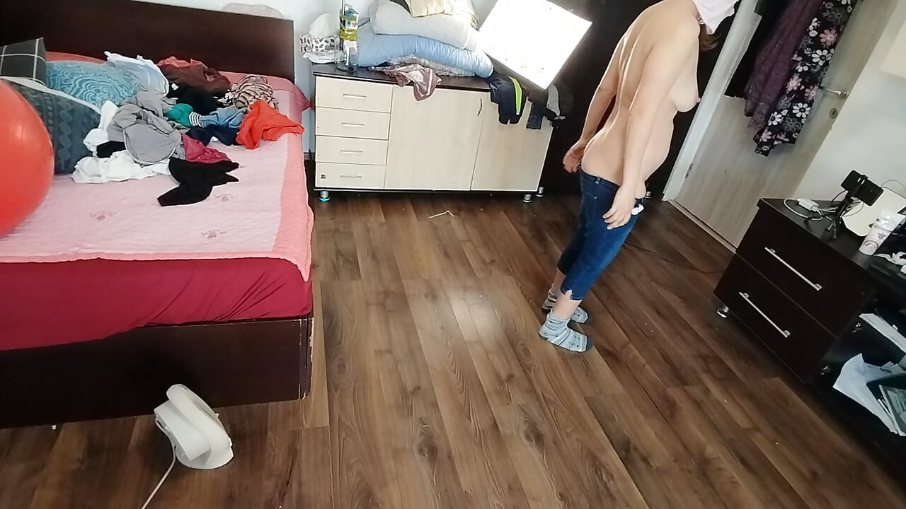 Amateur wife enjoys trying on clothes and cutting them.