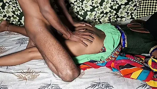 Auntie, clad in a red saree, approaches creating a beautiful and romantic moment filled with love anal sex