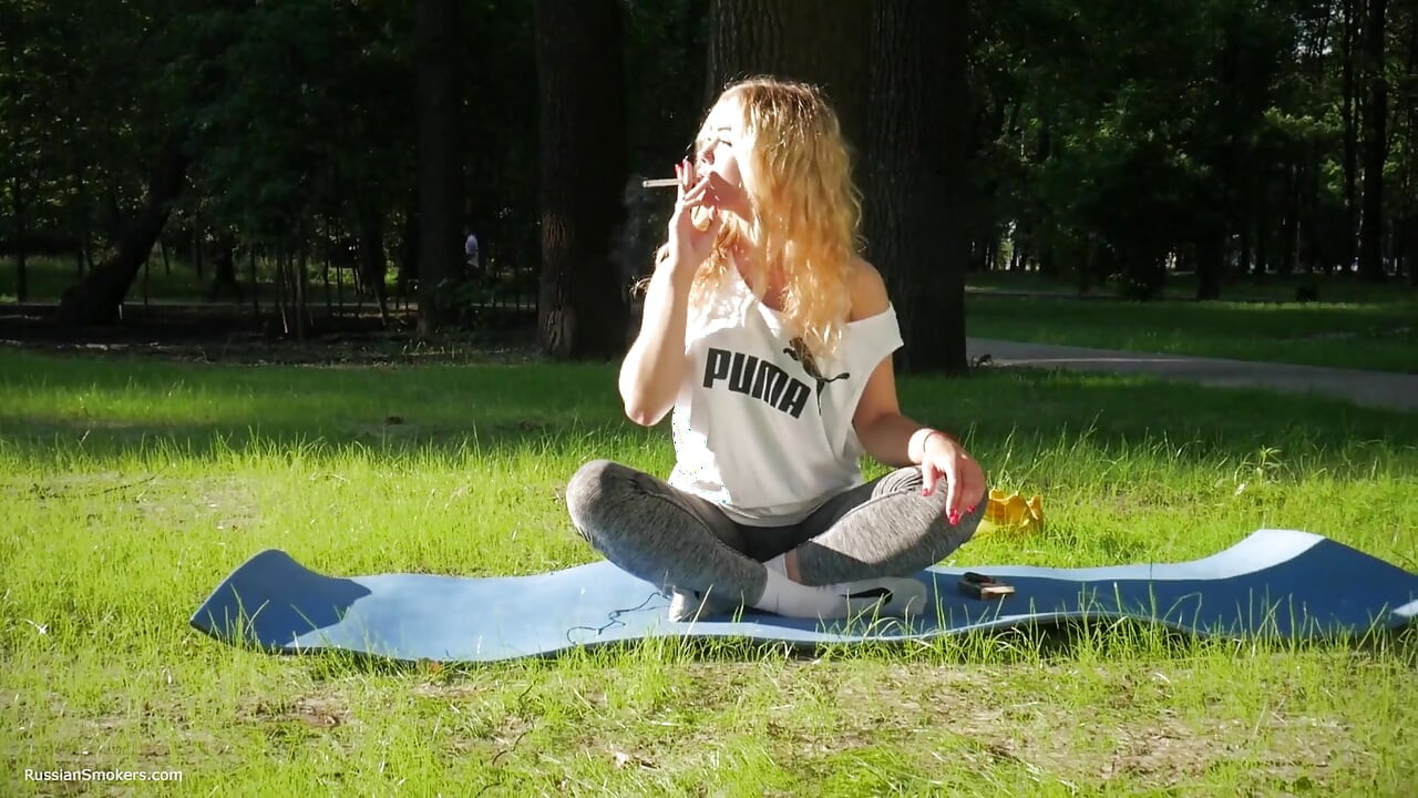 Sexy Russian Girl Smoking Cigarette Relaxed Outdoors