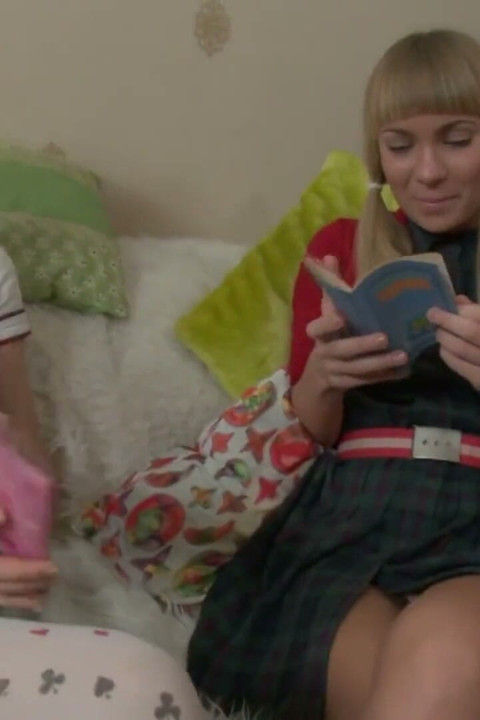 Two pretty teens lesbians fuck with sex toy