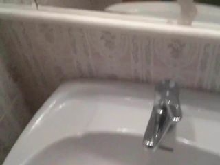 Cumming over the sink