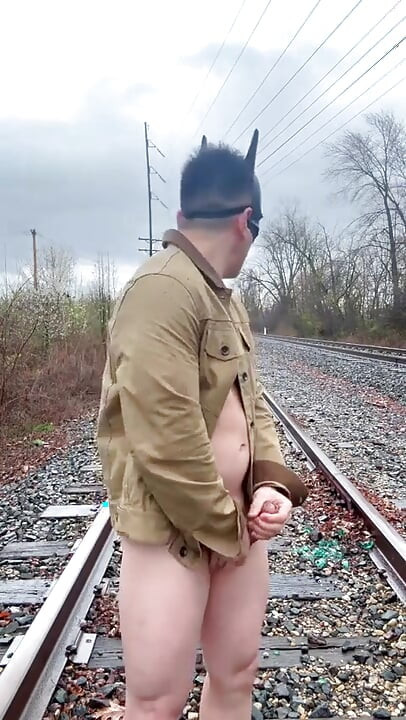 Rain-soaked Railroad Exhibition Muscular Asian Hunk Strips, Flexes, Cums Hard & Marks His Territory