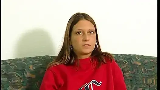 Татуированная брюнетка снимает одежду и показывает горячее татуированное тело