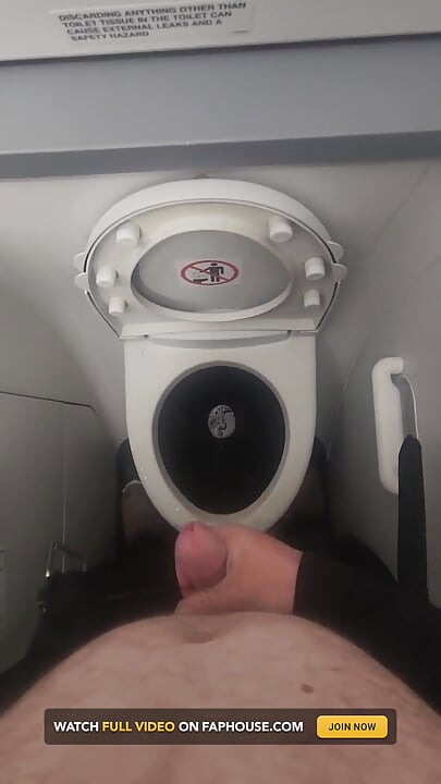 Airplane Bathroom Jerk and Cum.