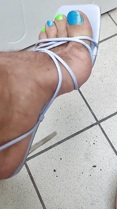 Sexy man feet in heels