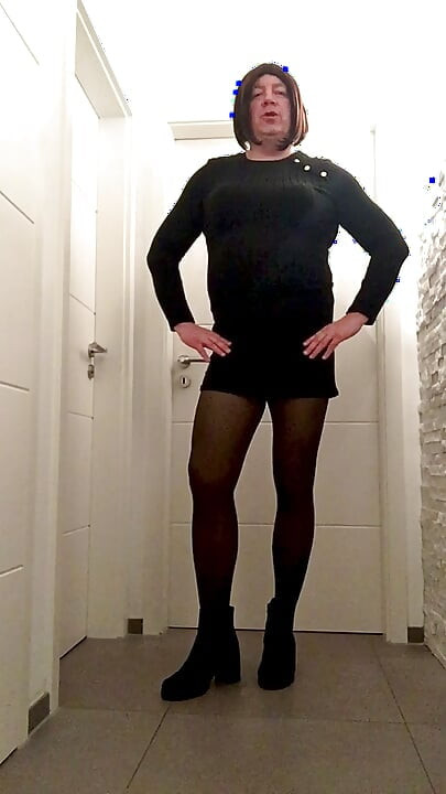 Nicki crossdress black knitted dress, tights and Chelsea boots