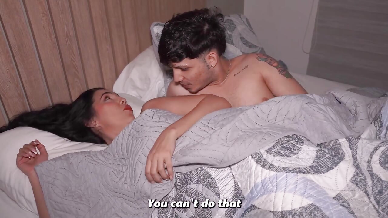 Big-bootied MILF stepson shares hotel bed and ends up sucking his cock!