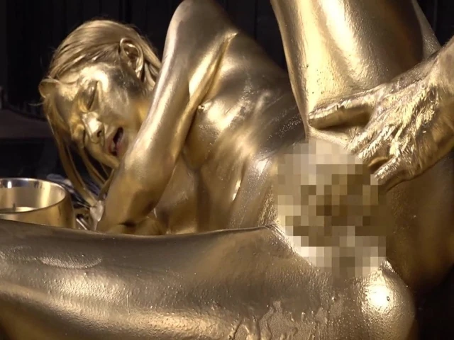 Cute gold girl in gold paint