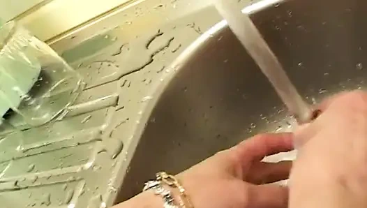 Masturbation in the kitchen for the mature slut