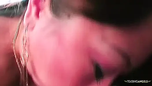 An Asian woman uses a large sex toy to pleasure herself and stimulate her partner to ejaculate