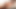 Redhead ladyboy in golden dress plays with her hairy dick