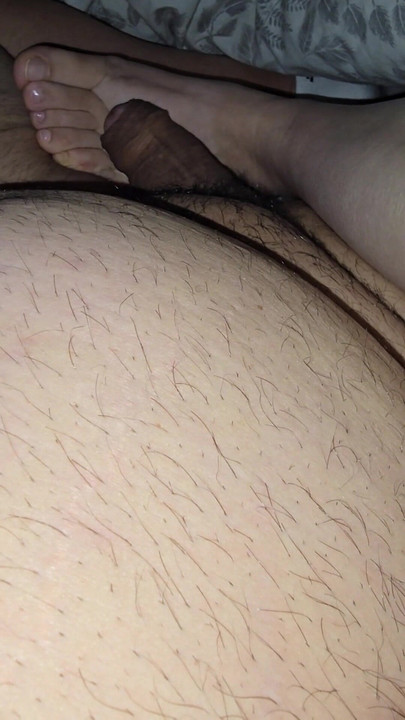 Step mom lets step son fuck her feet while sitting in bed | Clip 1