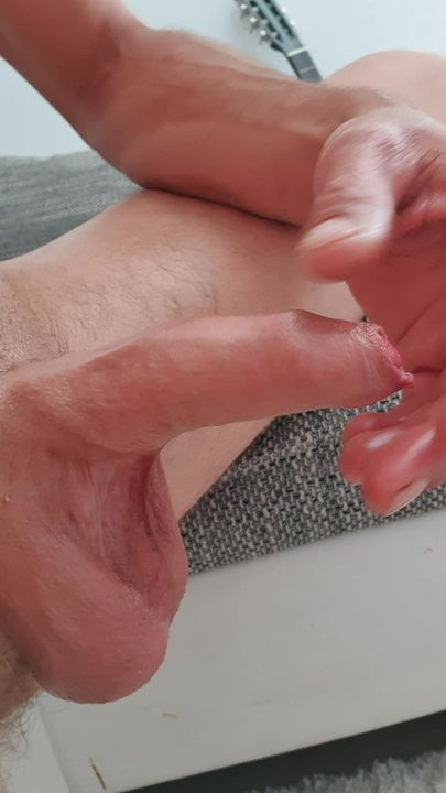 Playing with my uncut cock