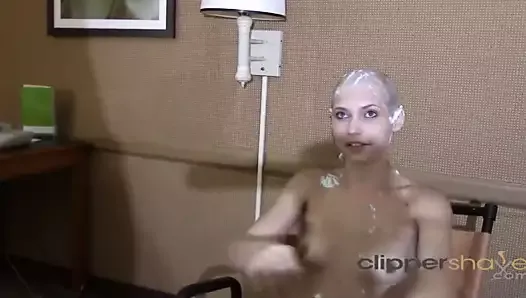 Blonde girl gets head shaved