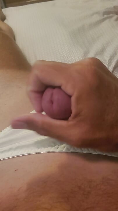 Sissy cums in his white satin panties.