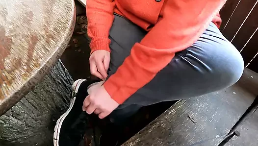 Vagina slapping and labia pulling on the picnic table