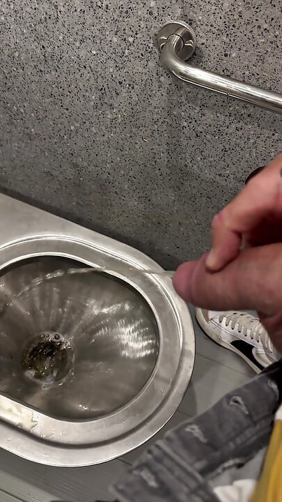 Jerking and Pissing on a Motorway Rest Area
