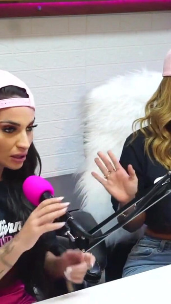 Thrilling moment from "Flavia Oliver performs oral sex on Natasha Steffens during the recording of the California Podcast"