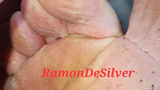 Master Ramon relaxes on the park bench and massages his hot feet and his divine cock, great