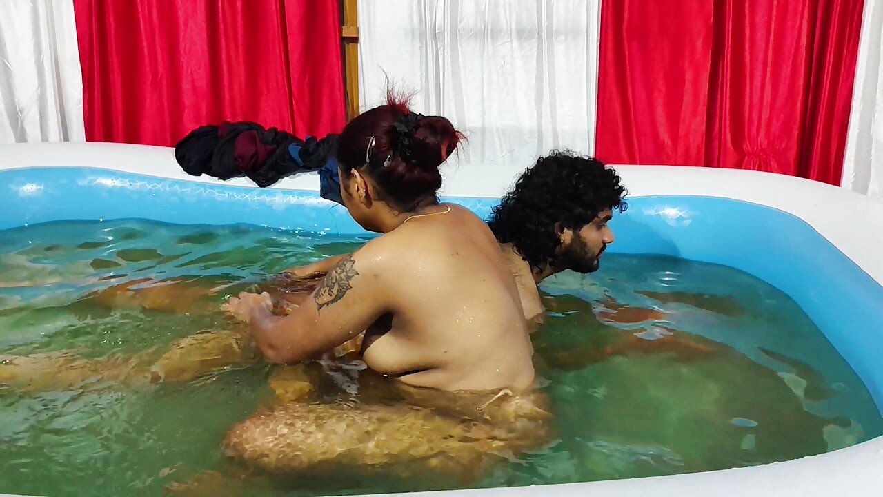 Couple bathing in pool