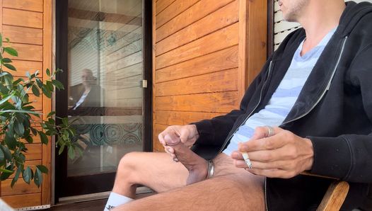 Smoke some cigarettes on my balcony jerkoff my big dick